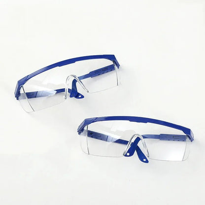 Pair of chemical goggles from BACKUPMYFILESNOW.COM® with dustproof, windproof, and splash-proof safety protection for laboratory work.