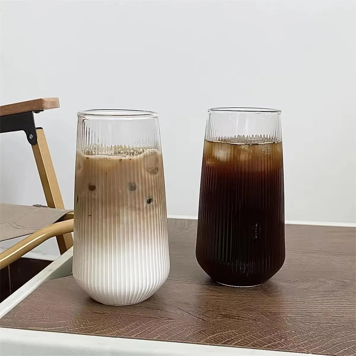 Two 500ml clear glass cups with simple stripe design, suitable for wine, coffee, water, whiskey, beer, and cocktails.