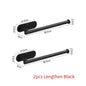 Stainless steel self-adhesive toilet paper and towel holder mounted on wall, perfect for kitchen or bathroom storage.
