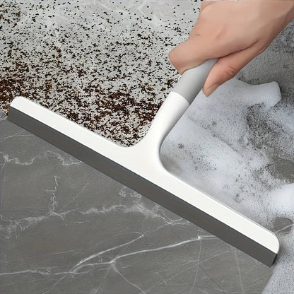 Two BACKUPMYFILESNOW.COM® silicone shower scraper cleaners for bathroom and glass cleaning, featuring multi-purpose squeegee and water wiper.