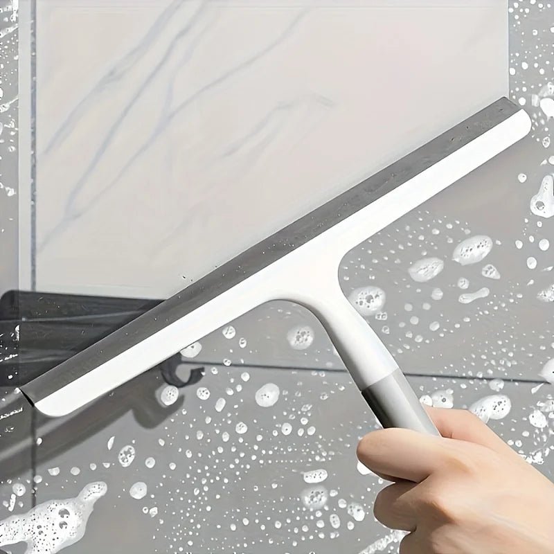 Two silicone shower scraper cleaners by BACKUPMYFILESNOW.COM®, versatile squeegees for glass, bathroom, and window cleaning.