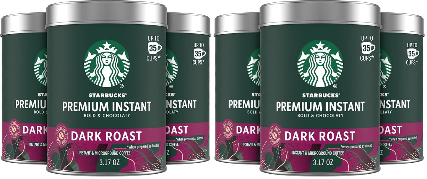 Three 3.17 oz tins of Starbucks Premium Instant Coffee with dark roast Arabica beans, featuring the product packaging and labels.