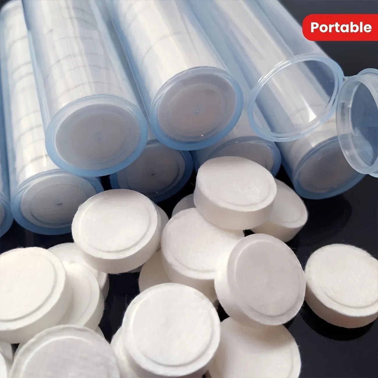 Three tubes of compressed white towels from BACKUPMYFILESNOW.COM, heavy-duty large, lightweight, ideal for camping, travel, and fitness.