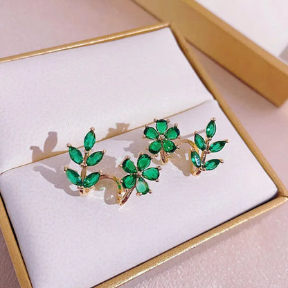 925 silver needle green flower earrings for women, Korean fashion jewelry with zircon leaf design and stud style.