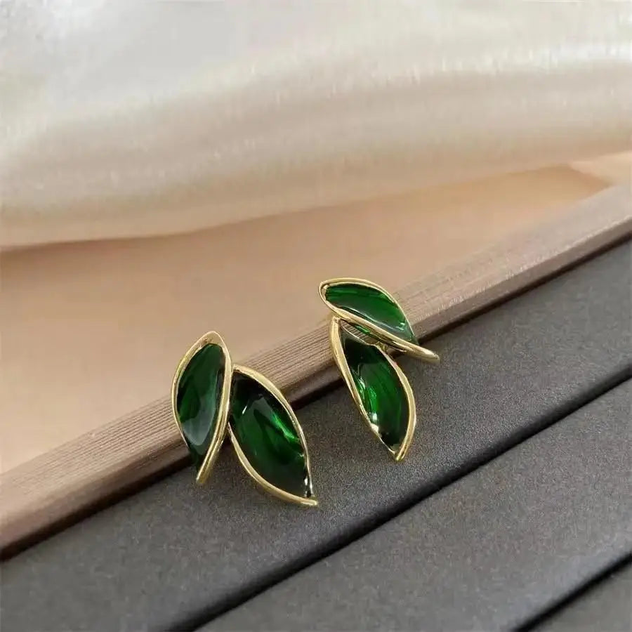 925 silver needle green flower earrings for women, Korean fashion jewelry with zircon leaf design and stud style.