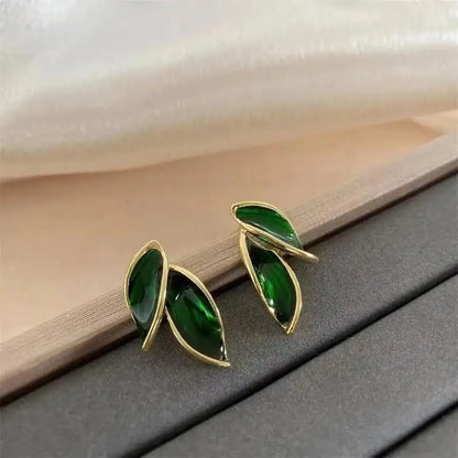 925 silver needle green flower earrings for women, Korean fashion jewelry with zircon leaf design and stud style.