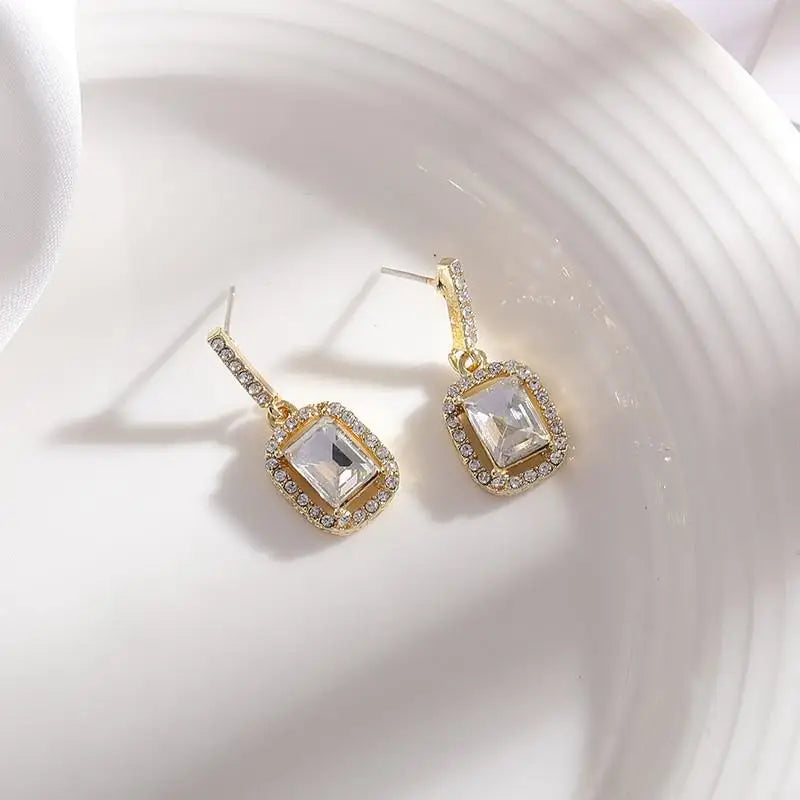 925 silver needle green flower earrings for women with zircon leaf design, Korean fashion jewelry, stylish stud earrings.