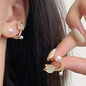 925 silver needle green flower earrings for women with zircon leaf design, Korean fashion jewelry, stylish stud earrings.