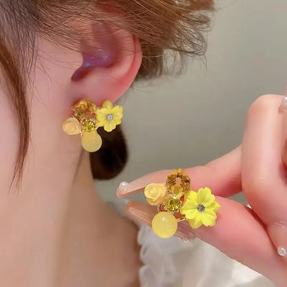925 silver needle green flower stud earrings for women featuring zircon leaf design, Korean fashion jewelry, trendy luxury style