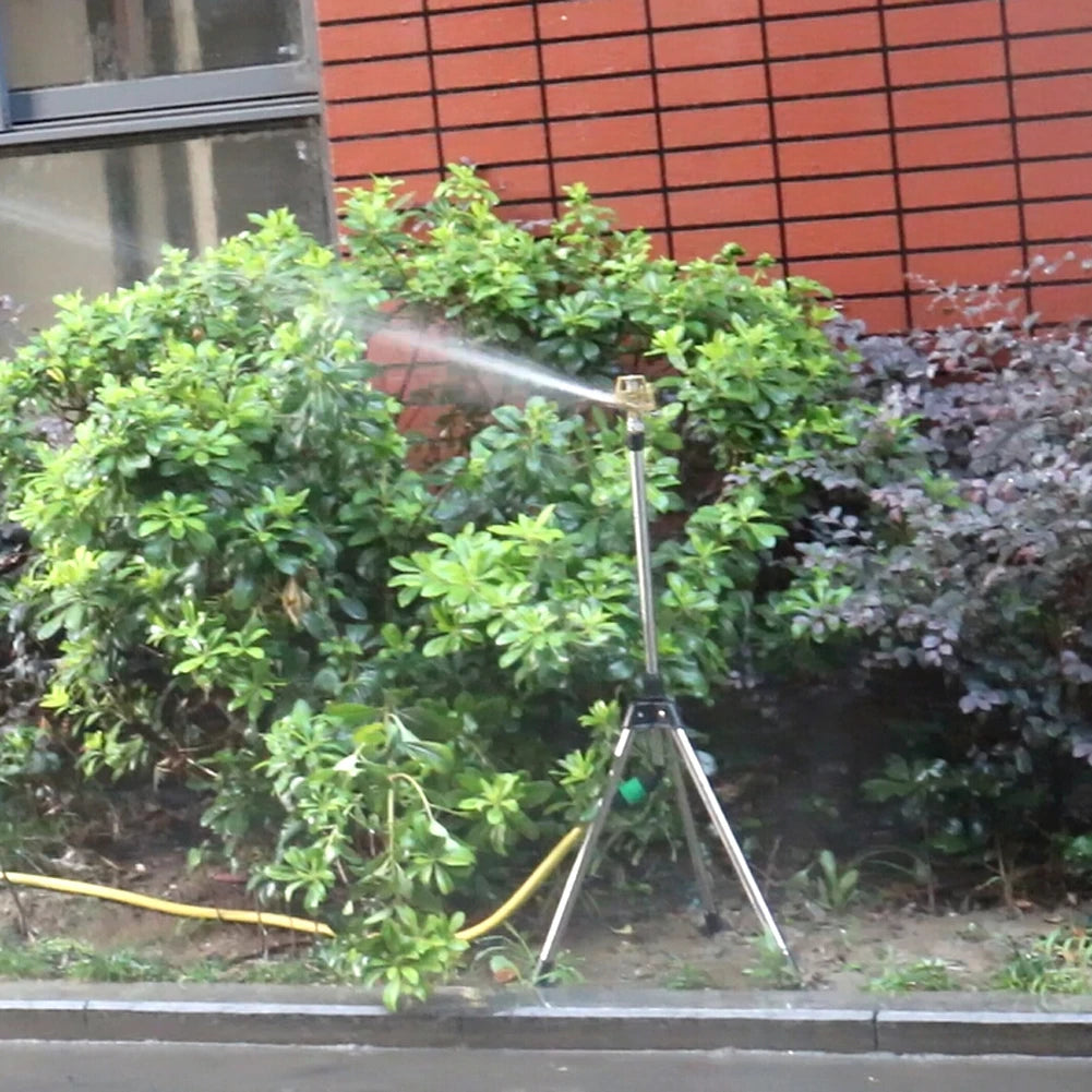 Stainless steel G1/2" adjustable irrigation tripod sprinkler for garden watering and irrigation system setup.