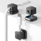Set of three black Sinjimoru magnetic cable clips for managing cables in car and office, with self-adhesive backing.