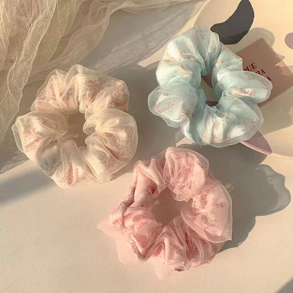 Trendy 1/3 piece sweet summer net-like hairband with large intestine design for women, perfect for early spring hairstyles.
