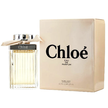 Chloe Eau de Parfum Spray for Women 4.2 oz bottle, elegant glass perfume bottle with a rounded cap, on a neutral background.