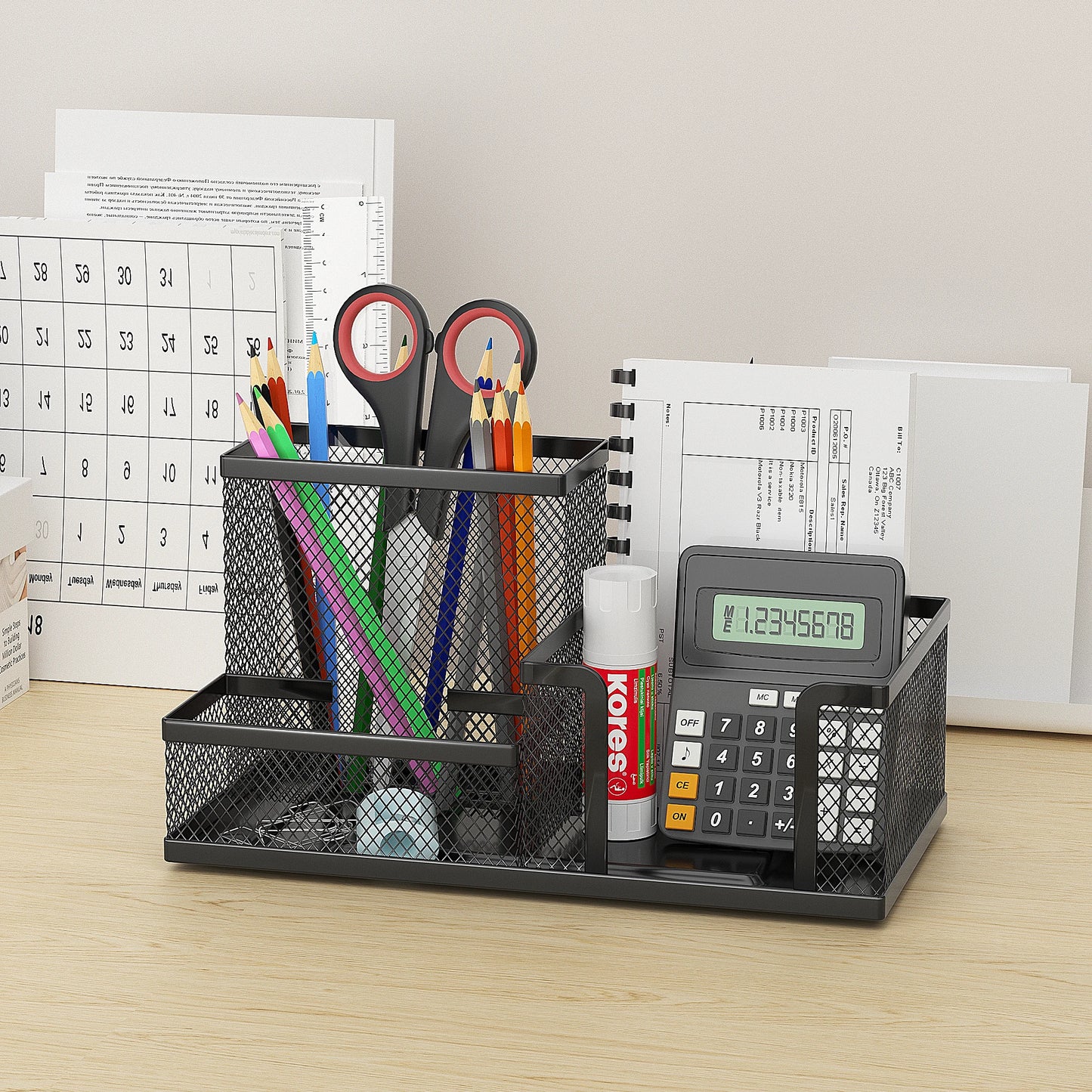 Black mesh desk organizer with three compartments, pencil holder, and storage baskets for office supplies and desktop accessories.