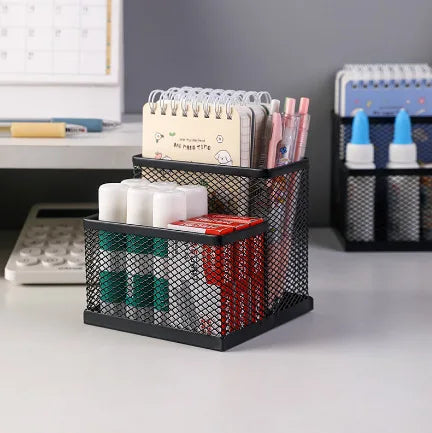 Black mesh desk organizer with three compartments, pencil holder, and storage baskets for office supplies and desktop accessories.