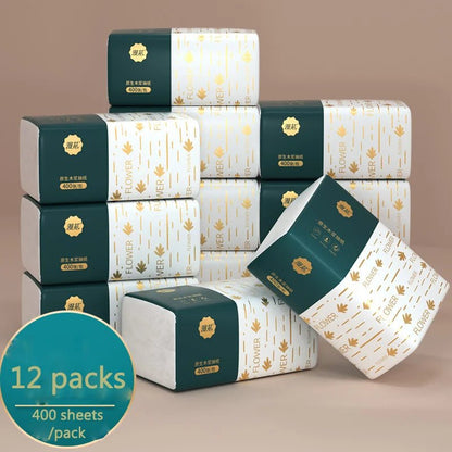 Four packs of BackupMyFilesNow® paper towels with 300 sheets each, stacked in 30 full boxes for household use.