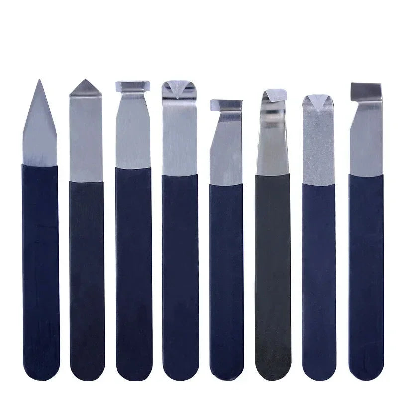 Set of four ceramic craft tools with rubber handles, stainless steel sculpting tools for pottery, ceramics, and clay sculpting projects.