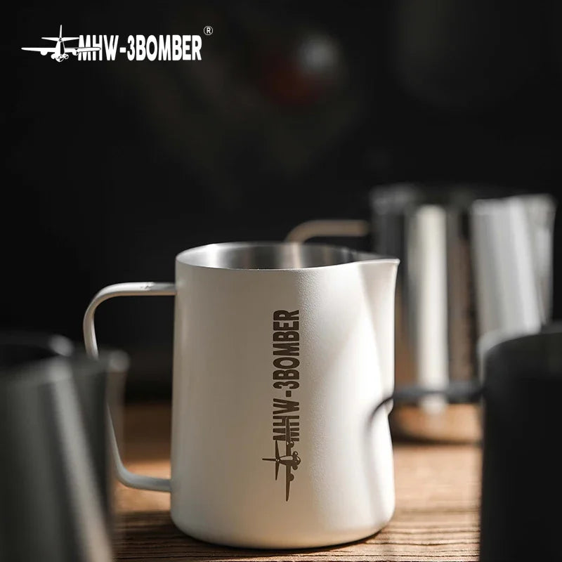 Stainless steel BackupMyFilesNow.com MHW-3BOMBER 3.0 milk frothing pitcher, 450ml for espresso and latte art, with a white handle.