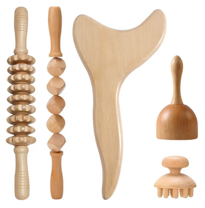 Wooden anti-cellulite hand massage roller set with four different rollers for skin massage and cellulite reduction.