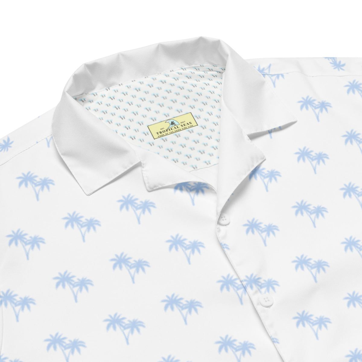 Bright tropical Blizzard Hawaiian shirt featuring vibrant floral and palm tree patterns from BACKUPMYFILESNOW® displayed on a mannequin.