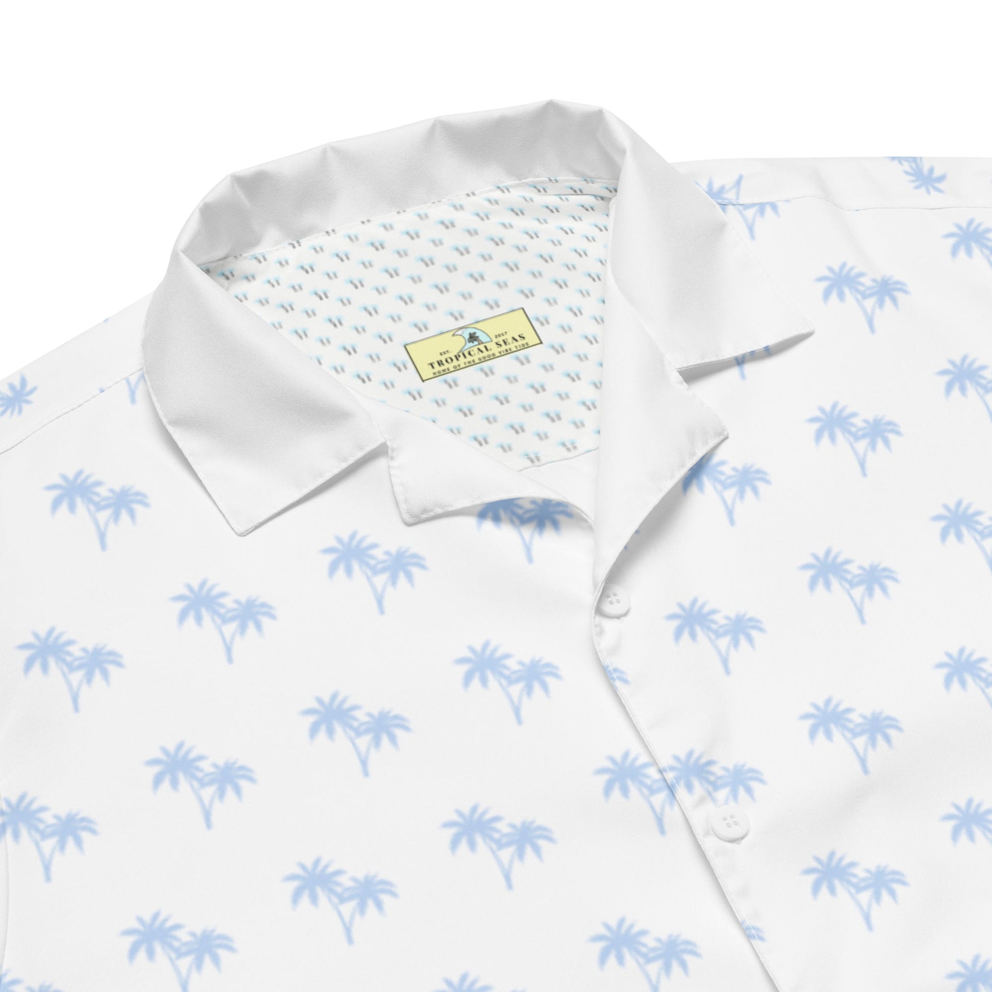 Bright tropical Blizzard Hawaiian shirt featuring vibrant floral and palm tree patterns from BACKUPMYFILESNOW® displayed on a mannequin.