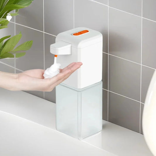 Wall-mounted BackupMyFilesNow.com Intelligent C1 automatic soap dispenser with foam, induction sensor, and phone drop feature.