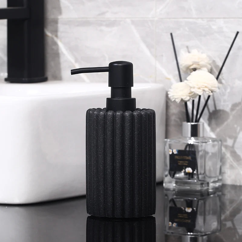 Creative 500ml BackupMyFilesNow.com hand sanitizer and soap dispenser in a modern bathroom setting, with lotion and bath gel bottles.