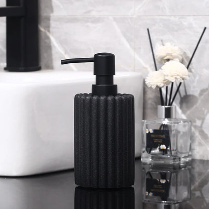 Creative 500ml BackupMyFilesNow.com hand sanitizer and soap dispenser in a modern bathroom setting, with lotion and bath gel bottles.