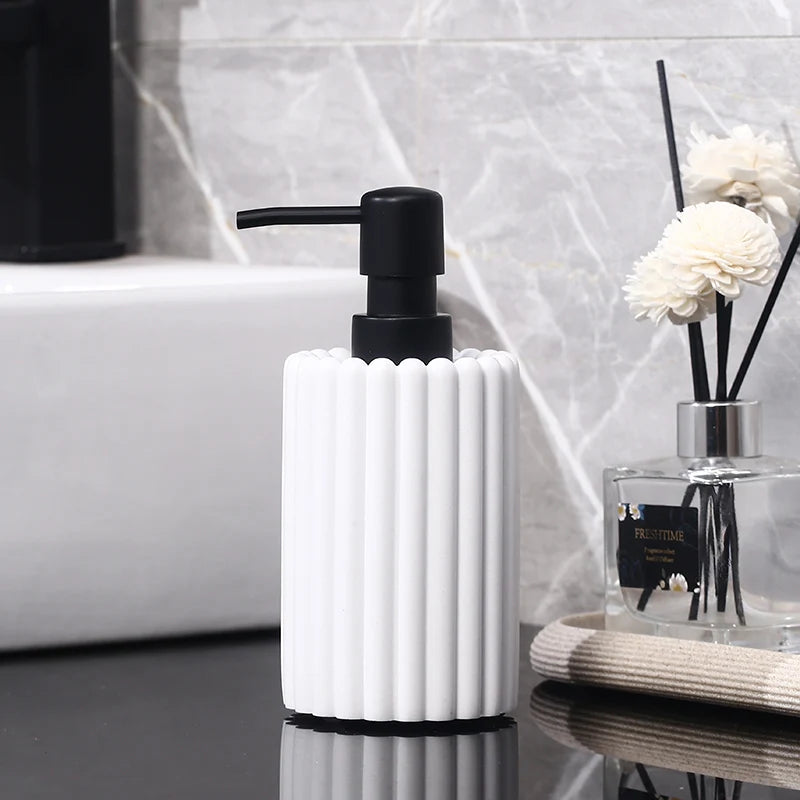 Creative 500ml hand sanitizer and lotion bottle with pump dispenser, suitable for hotel or home bathroom accessories.