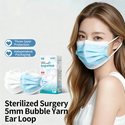 Box of 50 white disposable face masks with 5mm bubble yarn ear loops, 3-layer protective design for adult daily use.
