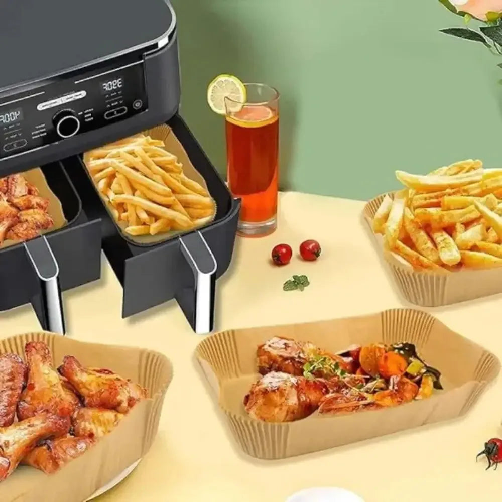 Set of 50/100 disposable rectangular air fryer paper mats, oilproof baking accessories for kitchen, microwave, and barbecue use.