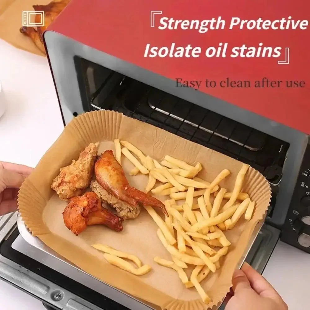 50/100pcs disposable air fryer paper rectangles, oilproof baking mats for kitchen, microwave, barbecue, and air fryer accessories.