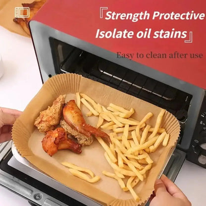50/100pcs disposable air fryer paper rectangles, oilproof baking mats for kitchen, microwave, barbecue, and air fryer accessories.