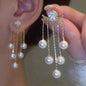 925 silver Korean fashion pearl tassel earrings with zircon accents for women, featuring elegant pearl and crystal details.