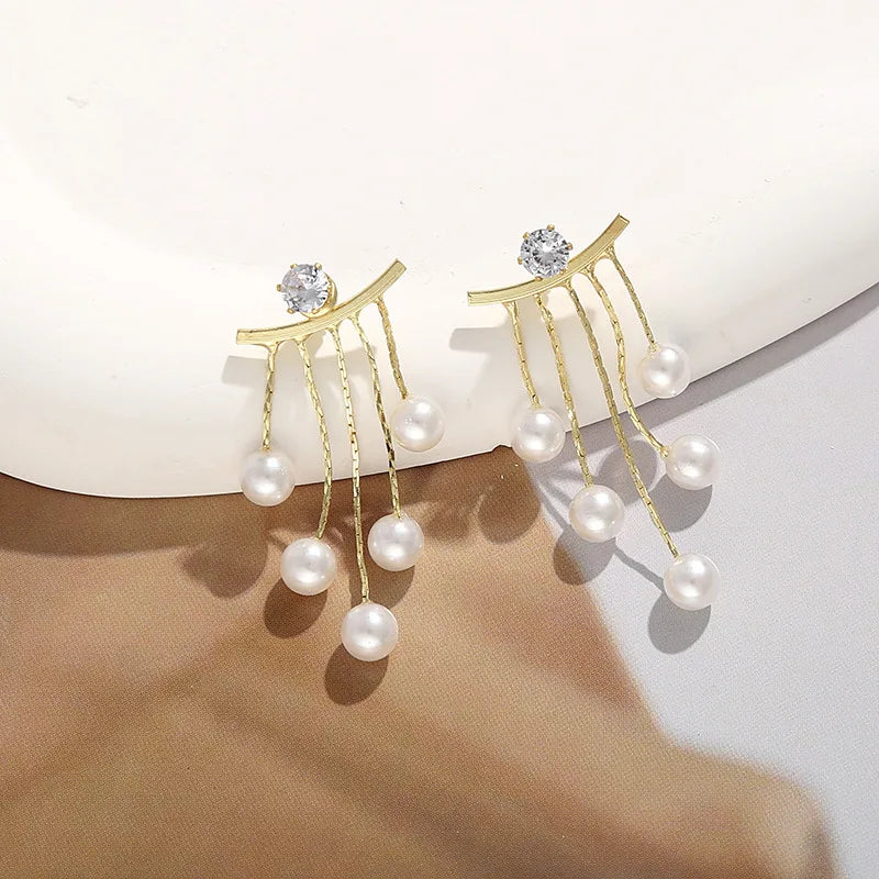925 silver Korean fashion pearl tassel earrings for women featuring zircon accents and elegant design, perfect for modern jewelry styles.