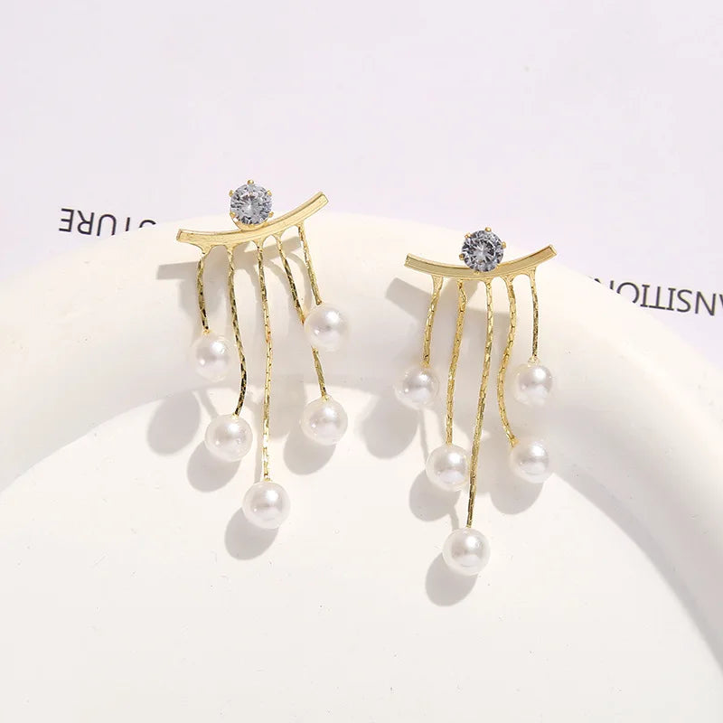 925 silver Korean fashion pearl tassel earrings with zircon accents for women, featuring elegant pearl and crystal details.