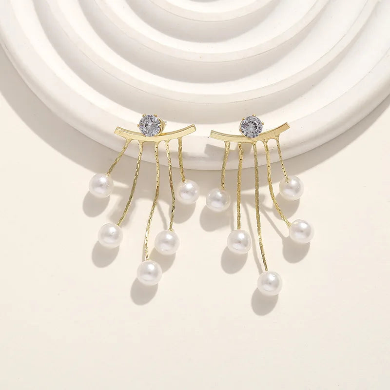 925 silver Korean fashion pearl tassel earrings for women with zircon accents, featuring elegant pearl and crystal details.