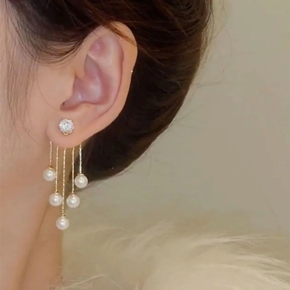 925 silver Korean fashion pearl tassel earrings for women, featuring zircon accents and elegant pearl dangles in trendy jewelry style
