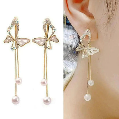 925 silver Korean fashion pearl tassel earrings for women featuring zircon accents and elegant pearl drops, trending luxury jewelry.