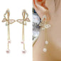 925 silver Korean fashion pearl tassel earrings for women featuring zircon accents and elegant pearl drops, trending luxury jewelry.