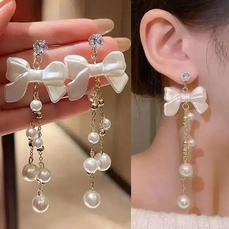 925 silver Korean fashion pearl tassel earrings for women, featuring zircon accents and intricate pearl detailing.