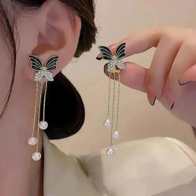 925 silver Korean fashion pearl tassel earrings with zircon accents, featuring pearl and crystal details for women’s jewelry.