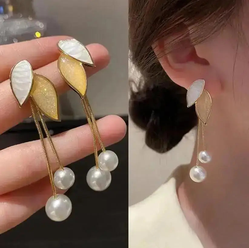 925 silver Korean fashion pearl tassel earrings for women featuring zircon accents and elegant pearl dangles.