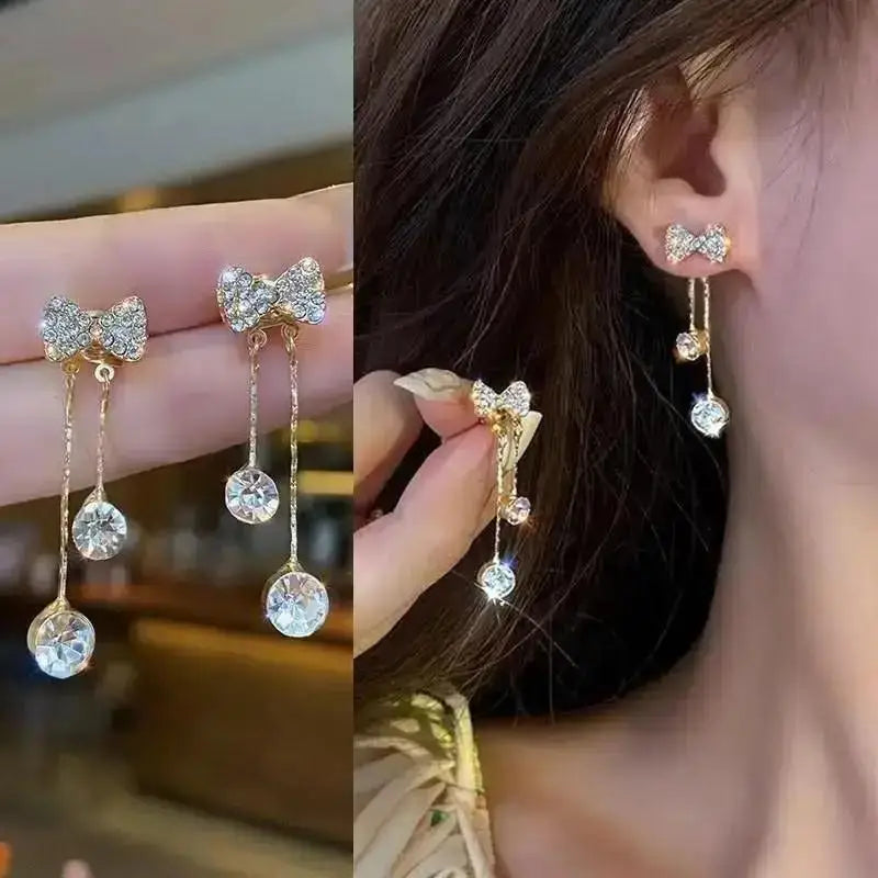 925 silver Korean fashion pearl tassel earrings for women with zircon accents, featuring elegant pearl dangles and trendy design