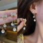 925 silver Korean fashion pearl tassel earrings for women with zircon accents, featuring elegant pearl dangles and trendy design
