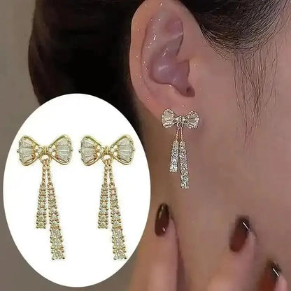 925 silver Korean fashion pearl tassel earrings for women, featuring zircon accents and elegant pearl details.