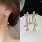 925 silver Korean fashion pearl tassel earrings for women featuring dangling zircon and pearl accents, stylish jewelry accessory.