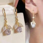 925 silver Korean fashion pearl tassel earrings for women with zircon accents, featuring a delicate pearl and crystal design.