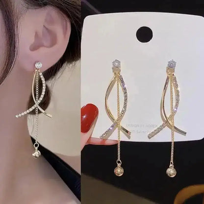 925 silver Korean fashion pearl tassel earrings for women with zircon accents, featuring elegant pearl and crystal details.