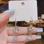 925 silver Korean fashion pearl tassel earrings for women with zircon accents, featuring elegant pearl and crystal details.